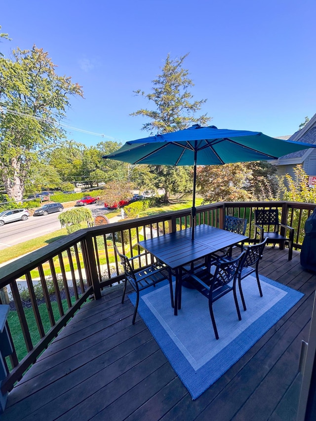 130 N Shore Dr Unit 8, South Haven, MI 49090 - wooden deck with outdoor dining area