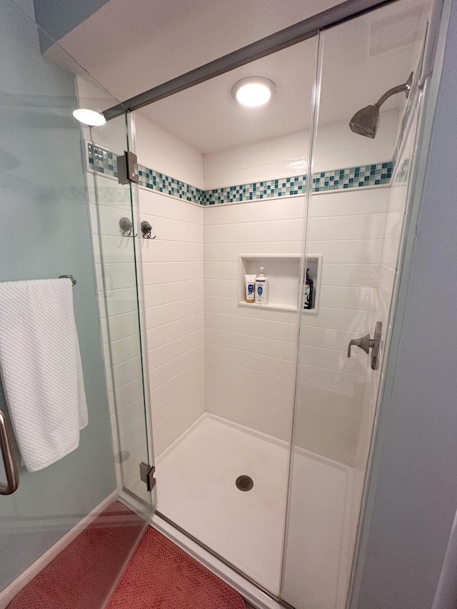 130 N Shore Dr Unit 8, South Haven, MI 49090 - bathroom featuring a stall shower