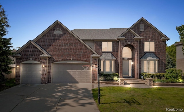 1231 Burns Dr, Troy, MI 48083 - view of front facade with concrete driveway, a garage, a front lawn, and brick siding