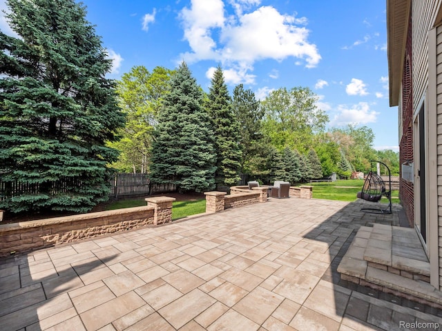 1231 Burns Dr, Troy, MI 48083 - fenced backyard with a patio area