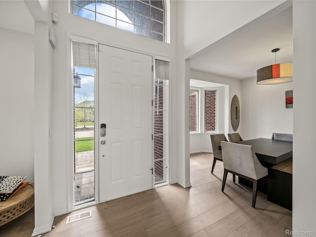 1231 Burns Dr, Troy, MI 48083 - entryway with wood finished floors and baseboards