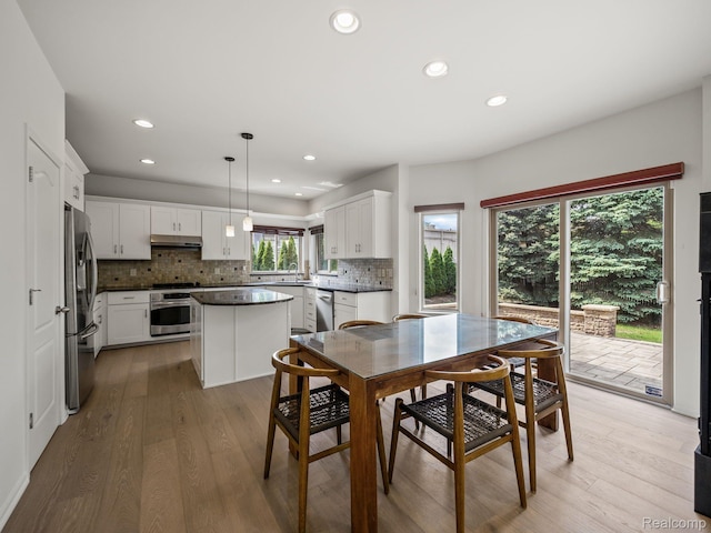 1231 Burns Dr, Troy, MI 48083 - dining area with recessed lighting and light wood-type flooring