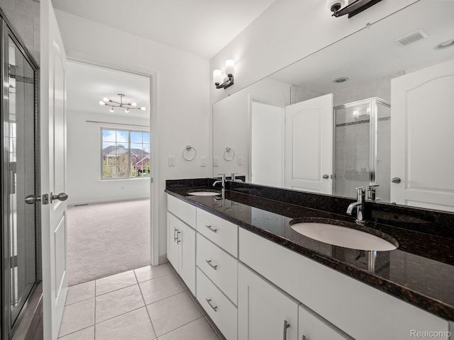 1231 Burns Dr, Troy, MI 48083 - full bath featuring double vanity, a shower stall, and tile patterned floors