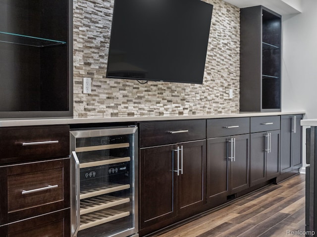 1231 Burns Dr, Troy, MI 48083 - bar with wine cooler, wood finished floors, and backsplash