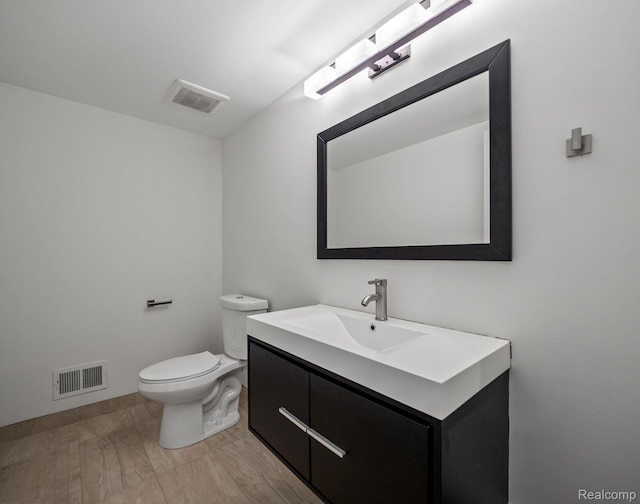 1231 Burns Dr, Troy, MI 48083 - half bath featuring vanity and toilet