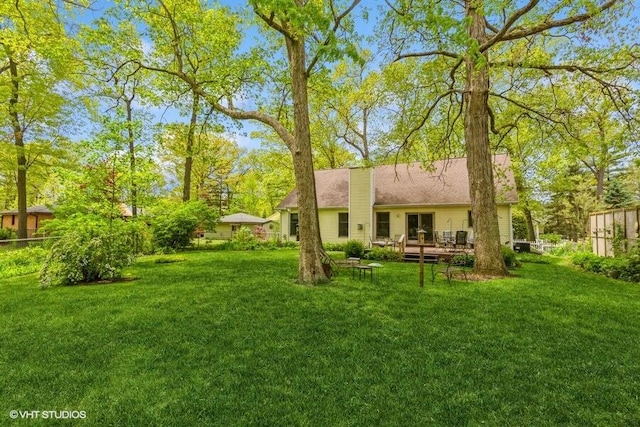 18855 Lonergan St, New Buffalo, MI 49117 - view of yard featuring a deck
