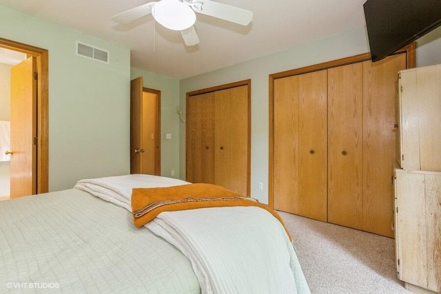18855 Lonergan St, New Buffalo, MI 49117 - bedroom featuring carpet flooring, multiple closets, and a ceiling fan
