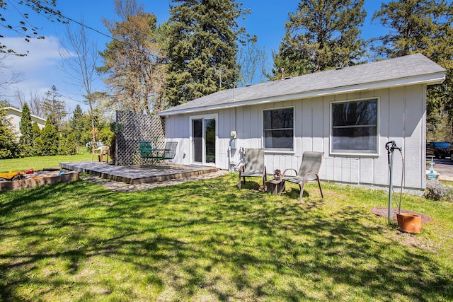2574 S Lake Pleasant Rd, Metamora, MI 48455 - back of property featuring a wooden deck and a yard