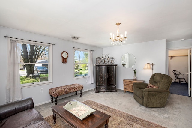 2574 S Lake Pleasant Rd, Metamora, MI 48455 - living room featuring a chandelier, carpet, and baseboards