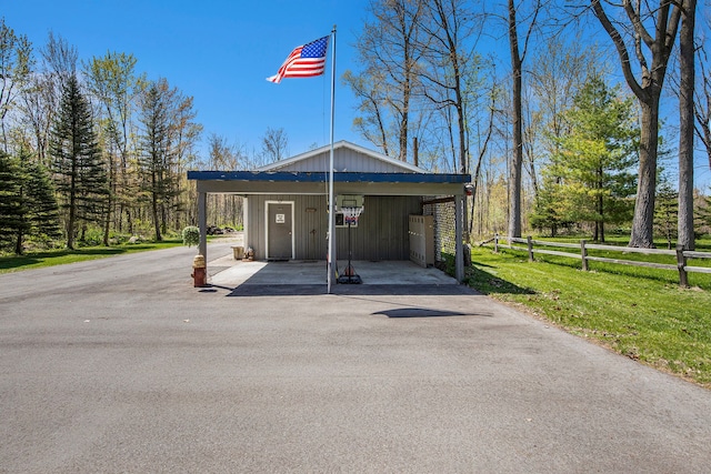 2574 S Lake Pleasant Rd, Metamora, MI 48455 - view of vehicle parking featuring asphalt driveway
