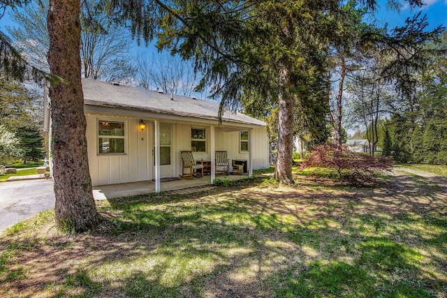 2574 S Lake Pleasant Rd, Metamora, MI 48455 - view of front facade with board and batten siding