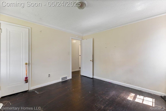 18965 Rutherford St, Detroit, MI 48235 - empty room with hardwood / wood-style floors, baseboards, and a textured ceiling