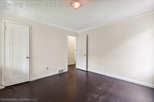 18965 Rutherford St, Detroit, MI 48235 - unfurnished bedroom with wood finished floors, baseboards, a textured ceiling, and crown molding
