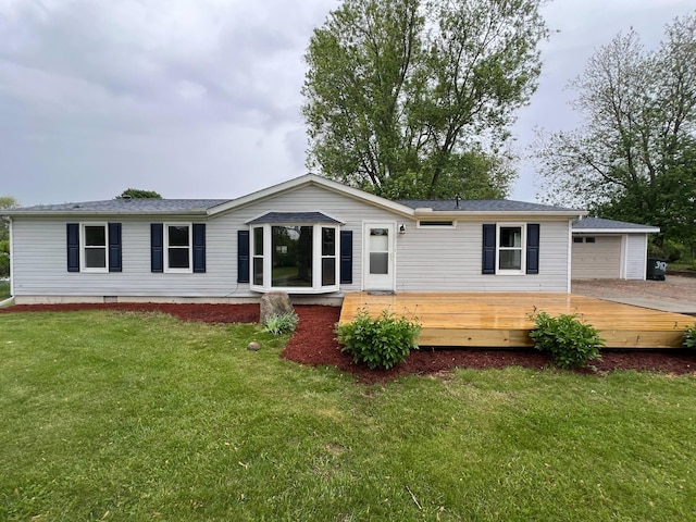 3820 Kaiser Rd, Tecumseh, MI 49286 - rear view of property featuring a deck and a lawn