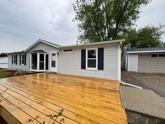 3820 Kaiser Rd, Tecumseh, MI 49286 - wooden terrace featuring a garage