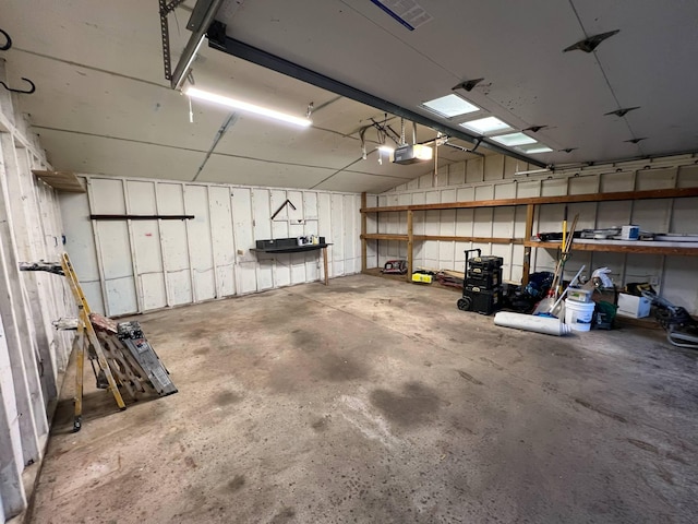 3820 Kaiser Rd, Tecumseh, MI 49286 - garage featuring a garage door opener