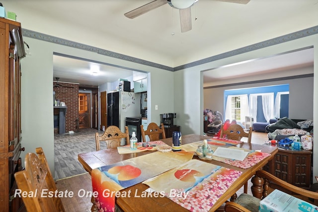 4080 Cat Lake Rd, Mayville, MI 48744 - dining area with wood finished floors and a ceiling fan