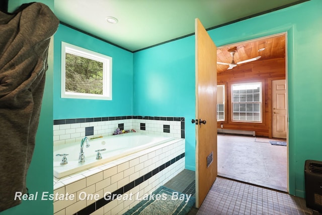 4080 Cat Lake Rd, Mayville, MI 48744 - bathroom featuring a garden tub, a baseboard radiator, tile patterned floors, wood ceiling, and ceiling fan