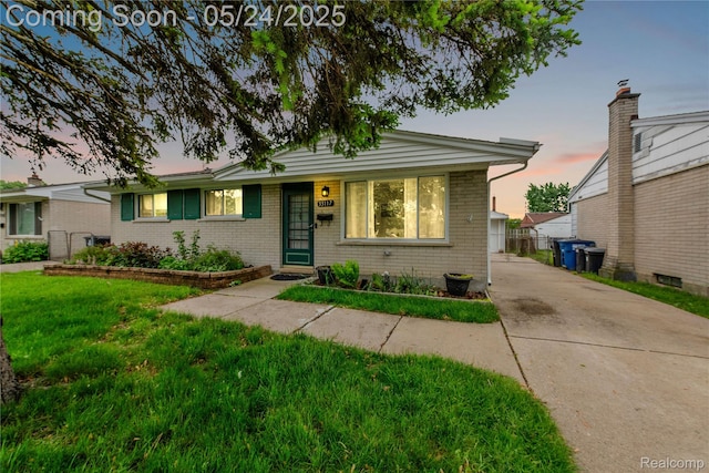 33117 Avondale St, Westland, MI 48186 - view of front of property featuring brick siding and concrete driveway