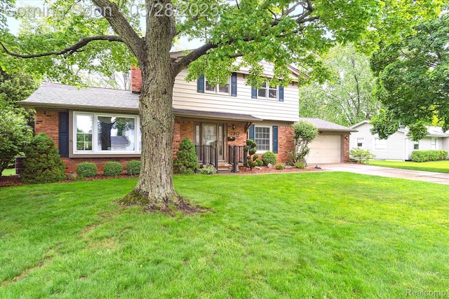 11217 Woodbridge Dr, Grand Blanc, MI 48439 - view of front of home with brick siding, concrete driveway, a chimney, a front yard, and an attached garage