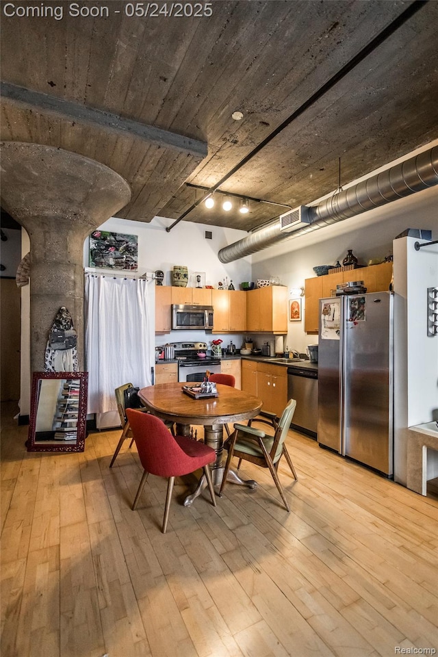 460 W Canfield St # 212/Unit 21, Detroit, MI 48201 - dining room with light wood-style flooring