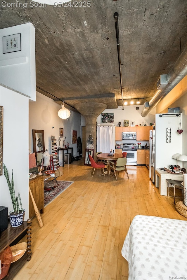 460 W Canfield St # 212/Unit 21, Detroit, MI 48201 - dining room with light wood-style flooring