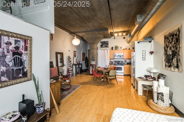 460 W Canfield St # 212/Unit 21, Detroit, MI 48201 - dining room with light wood-style floors and decorative columns