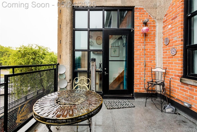 460 W Canfield St # 212/Unit 21, Detroit, MI 48201 - doorway to property featuring brick siding and a balcony