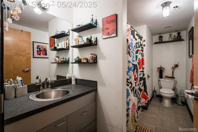 460 W Canfield St # 212/Unit 21, Detroit, MI 48201 - bathroom with toilet, vanity, and a shower with shower curtain