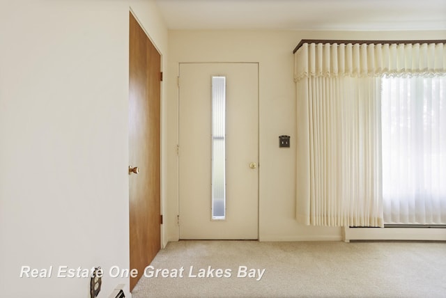 5354 N River Rd, Freeland, MI 48623 - entryway with carpet and baseboard heating