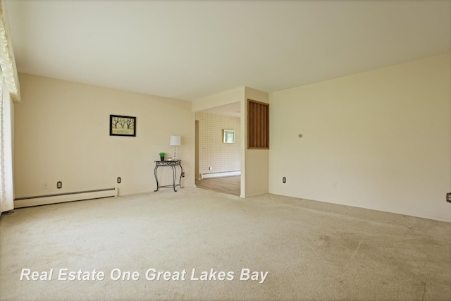 5354 N River Rd, Freeland, MI 48623 - carpeted spare room with baseboard heating