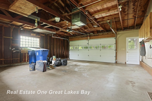 5354 N River Rd, Freeland, MI 48623 - garage featuring a heating unit