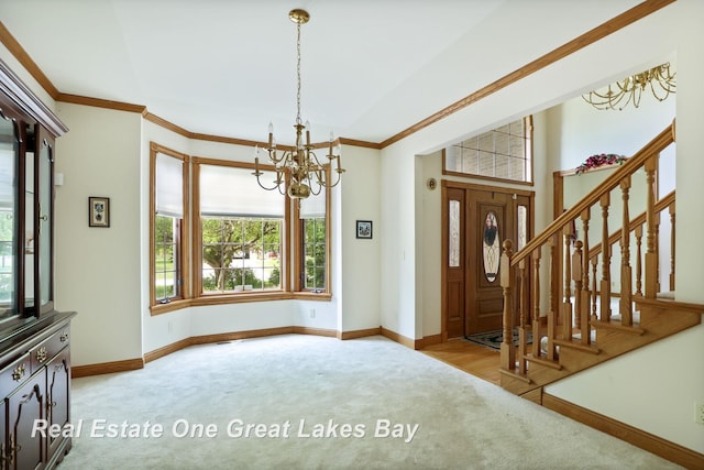 4168 Windemere Dr, Saginaw, MI 48603 - foyer with carpet flooring, a chandelier, baseboards, crown molding, and stairs