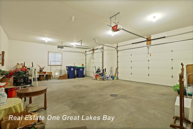 4168 Windemere Dr, Saginaw, MI 48603 - garage featuring a garage door opener