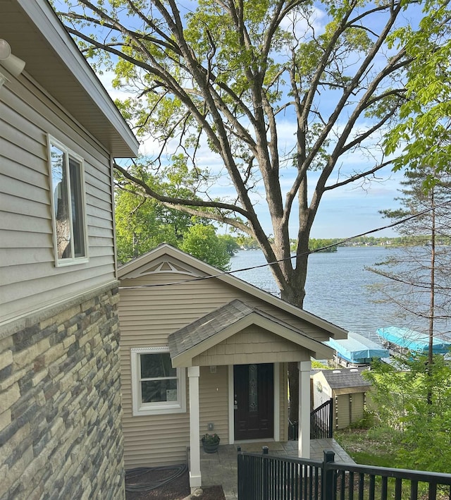 property entrance featuring a water view
