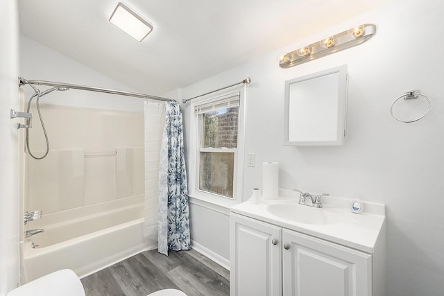 25949 Southwestern Hwy, Redford, MI 48239 - bathroom with wood finished floors, vaulted ceiling, shower / bath combination with curtain, vanity, and toilet