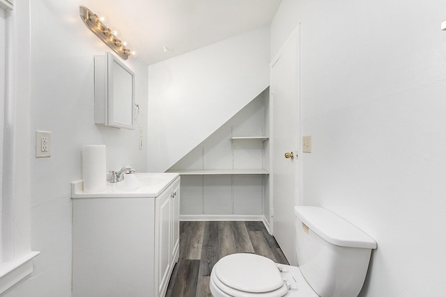 25949 Southwestern Hwy, Redford, MI 48239 - half bath featuring toilet, wood finished floors, and vanity