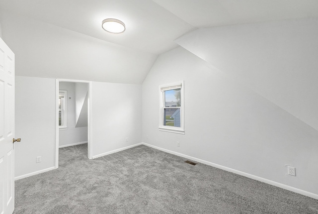 25949 Southwestern Hwy, Redford, MI 48239 - additional living space featuring carpet, vaulted ceiling, and baseboards