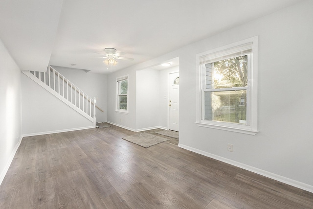 25949 Southwestern Hwy, Redford, MI 48239 - entrance foyer featuring a ceiling fan, wood finished floors, stairway, and baseboards