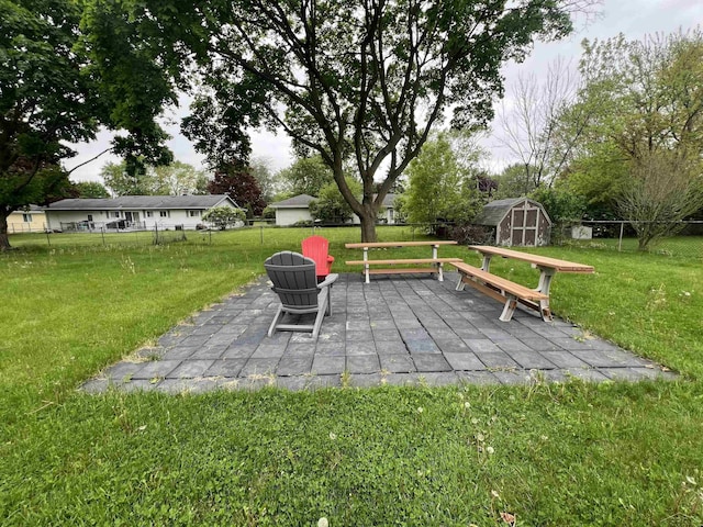 1441 Dover Pl, Saginaw, MI 48638 - view of yard featuring a patio area