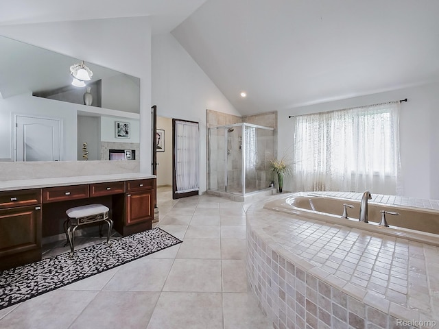 4575 Forest Edge Ln, West Bloomfield, MI 48323 - full bathroom with a shower stall, a bath, vanity, tile patterned floors, and high vaulted ceiling