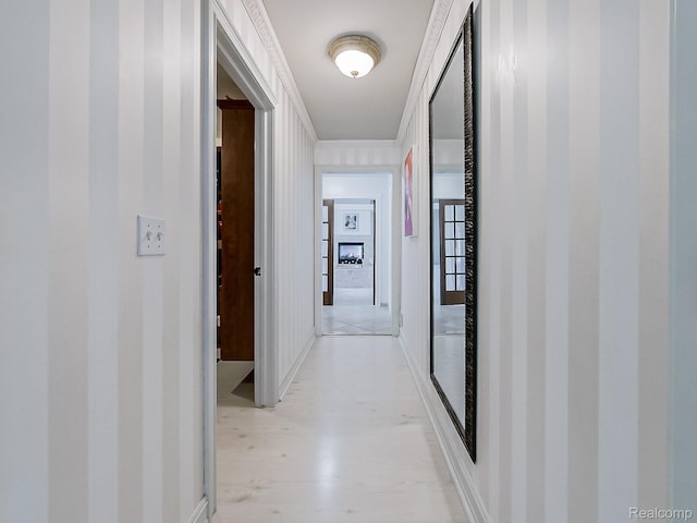 4575 Forest Edge Ln, West Bloomfield, MI 48323 - hall featuring baseboards, light wood-style flooring, and ornamental molding