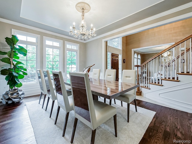 4575 Forest Edge Ln, West Bloomfield, MI 48323 - dining area featuring healthy amount of natural light, dark wood finished floors, a chandelier, ornamental molding, and stairway