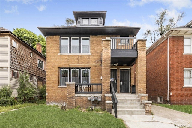 12242 Washburn St, Detroit, MI 48204 - american foursquare style home featuring a balcony, brick siding, and a front lawn