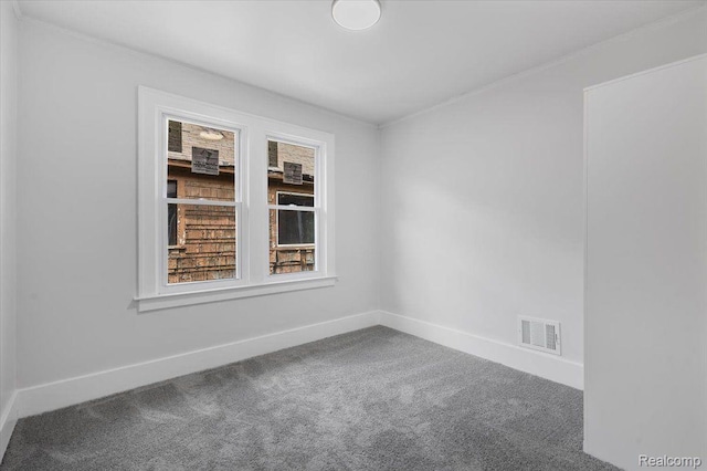 12242 Washburn St, Detroit, MI 48204 - carpeted spare room with baseboards and crown molding