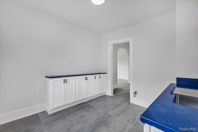 12242 Washburn St, Detroit, MI 48204 - hallway with arched walkways and baseboards