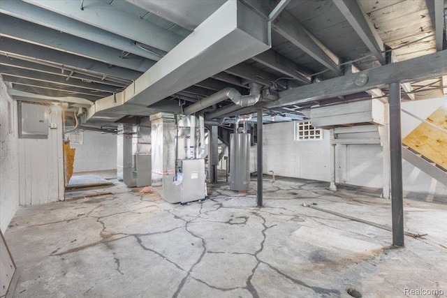 12242 Washburn St, Detroit, MI 48204 - unfinished below grade area with gas water heater, electric panel, and heating unit
