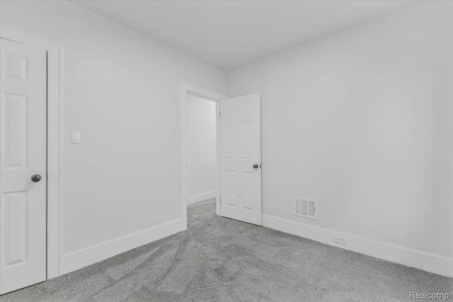 12242 Washburn St, Detroit, MI 48204 - carpeted empty room with baseboards