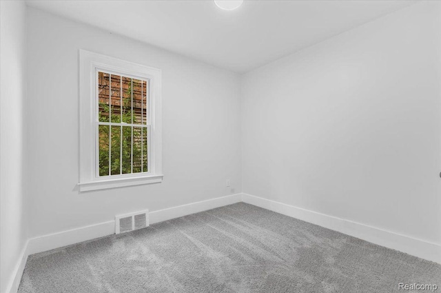 12242 Washburn St, Detroit, MI 48204 - unfurnished room featuring carpet and baseboards