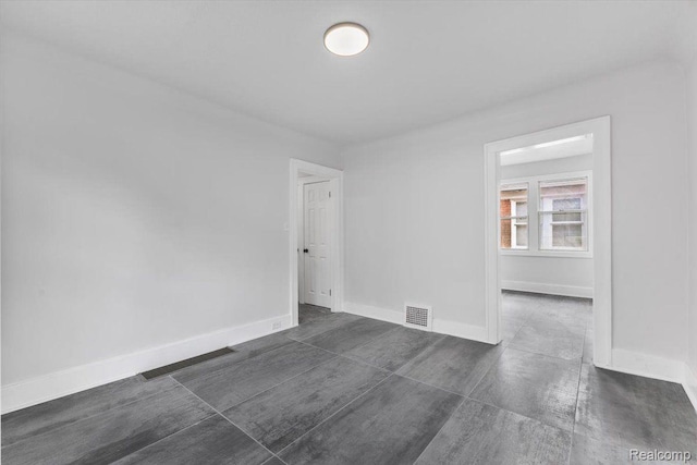 12242 Washburn St, Detroit, MI 48204 - spare room featuring baseboards